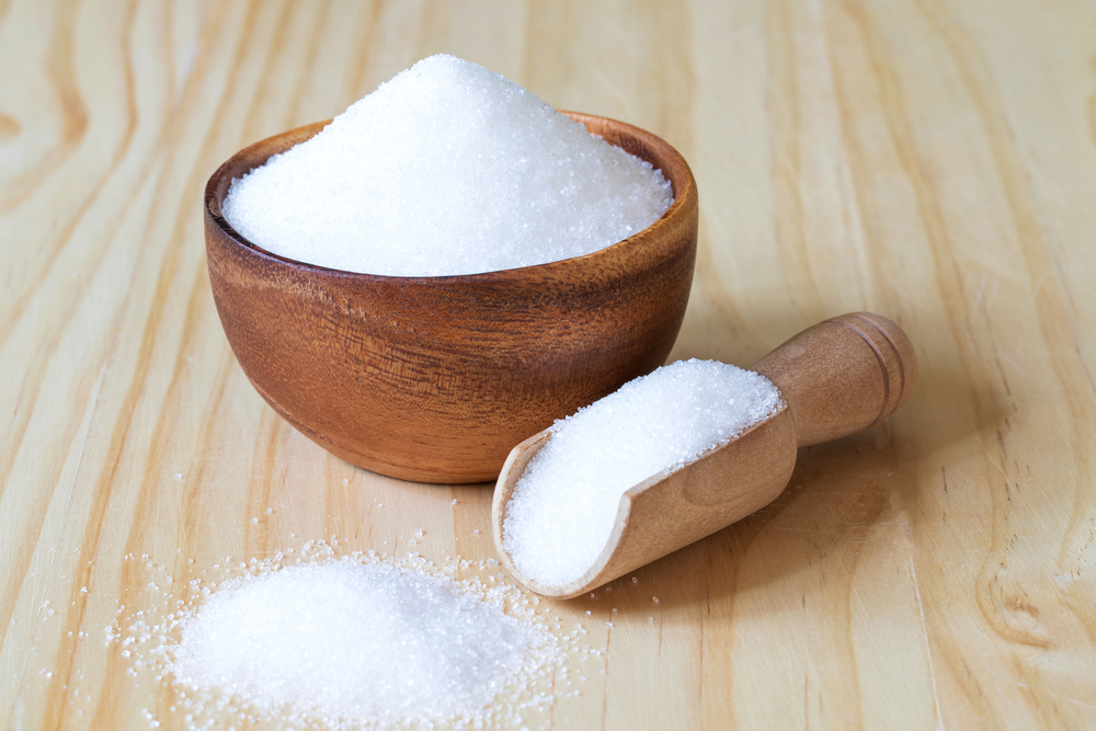 Bowl,And,Scoop,With,White,Sand,Sugar,On,Wooden,Background